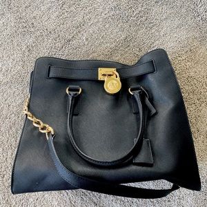 Black leather Michael Kors Hamilton purse.